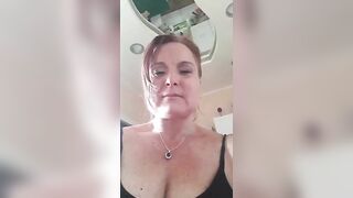 Desiderame mature busty lady in a short black dress and stockings masturbates her pussy with a pink vibrator 2019-08-08 12:00