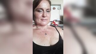 Desiderame mature busty lady in a short black dress and stockings masturbates her pussy with a pink vibrator 2019-08-08 12:00