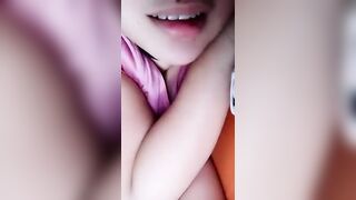 Celeste 678 very cute young brunette caresses her boobs through a pink t-shirt 2020-01-03 10:28