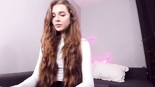 Purple_baby curly-haired teen in white sweater and leather skirt touches her small nude boobs 2020-09-15 19:20