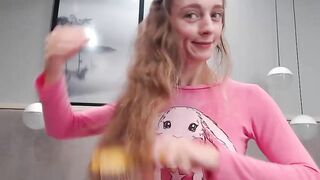 Shyschoolgrl modest doll with long hair in a pink blouse smiles very nicely at the camera 2019-10-07 18:58